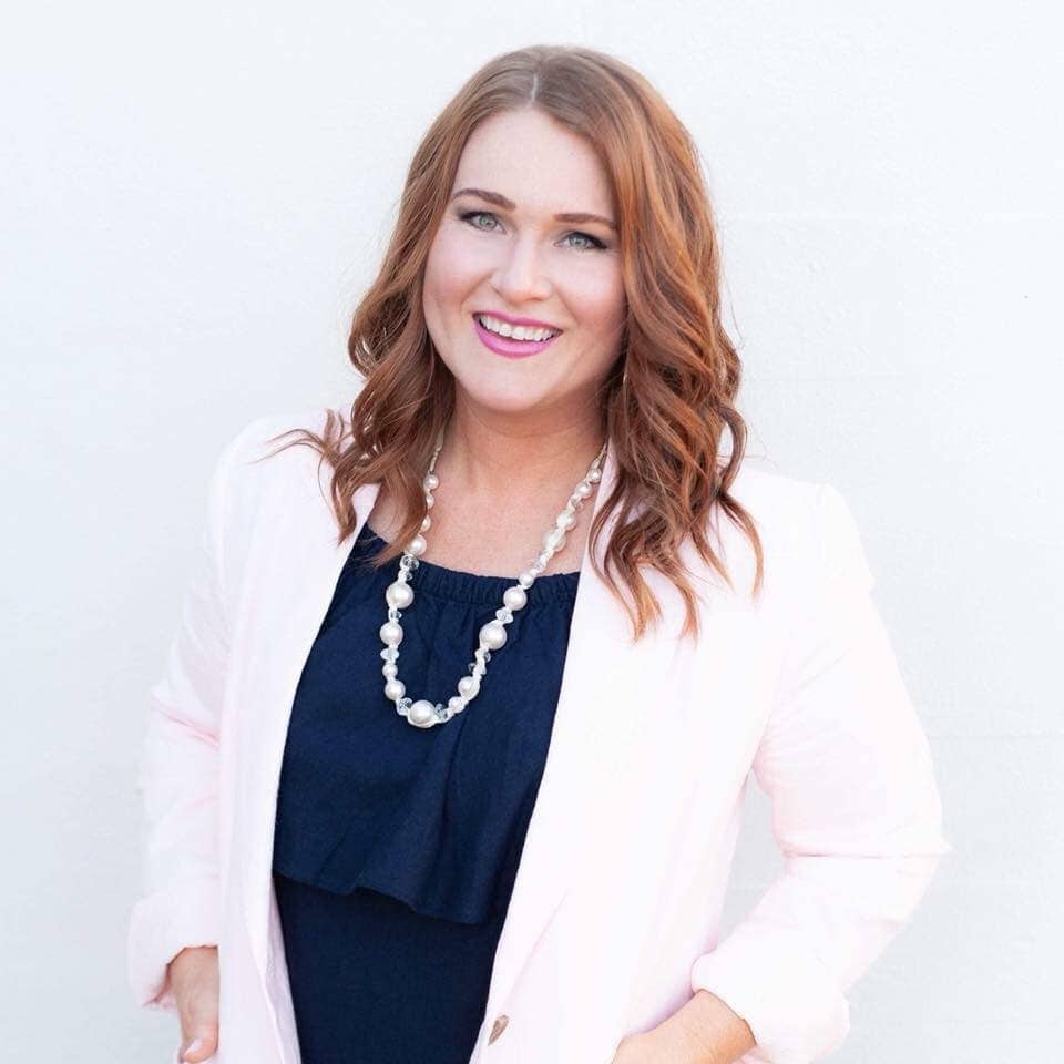 Tiffany Williams smiling in a professional portrait for Church Awakening.